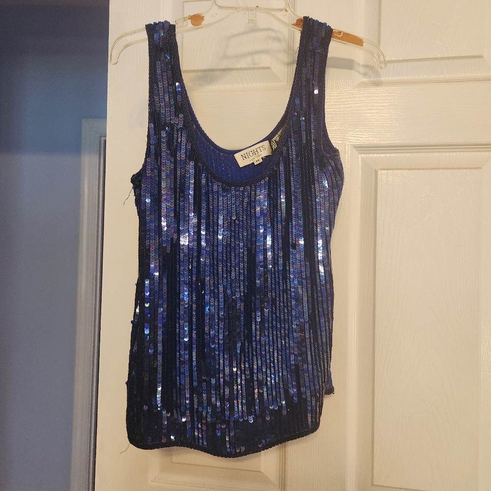 a blue sequin tank top in size medium